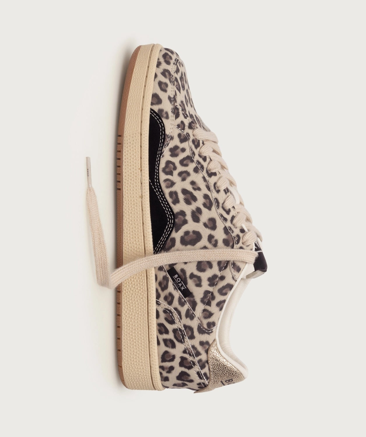 Leopard print sneaker on a light gray background