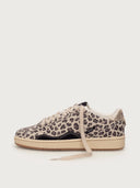 Leopard print sneaker on a light gray background